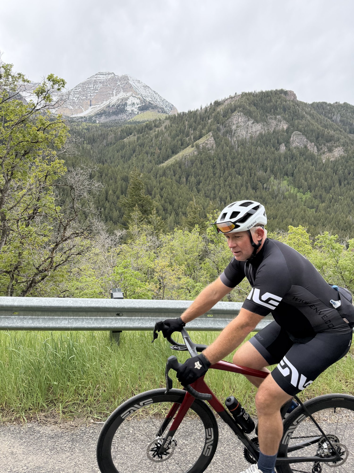 Seth riding with mountains in the background