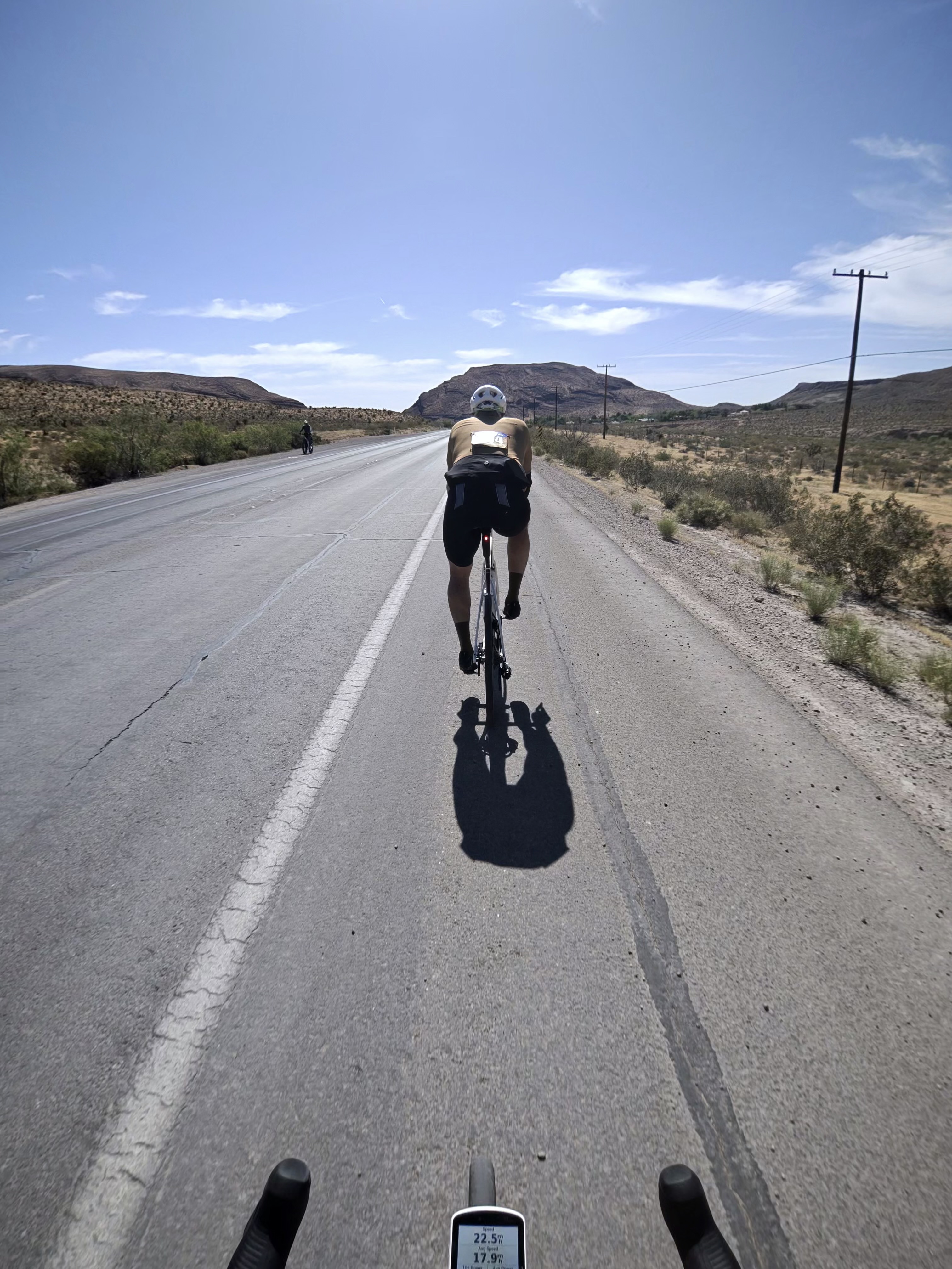 Desert highway with mountains ahead